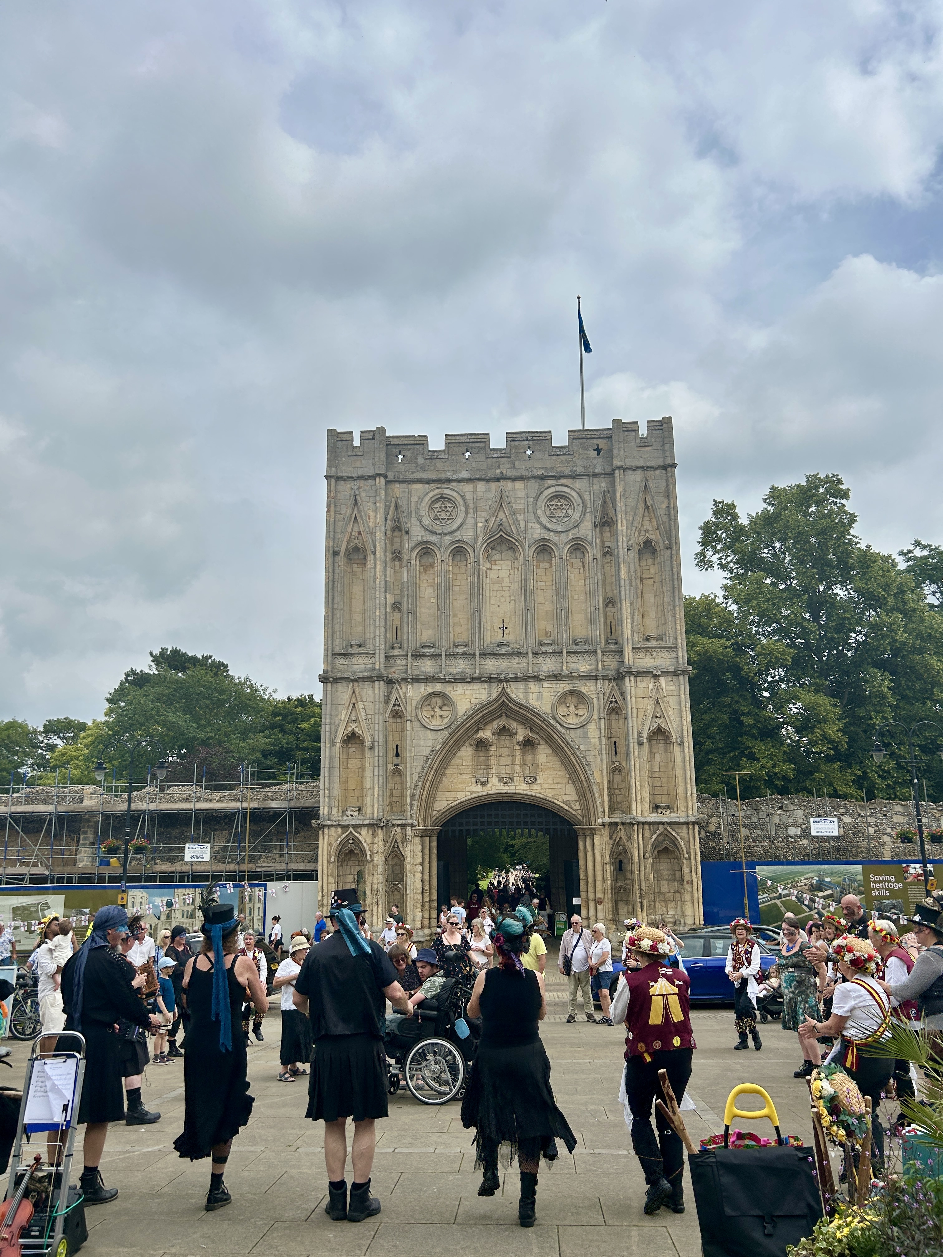 Community celebrations with a historic building behind
