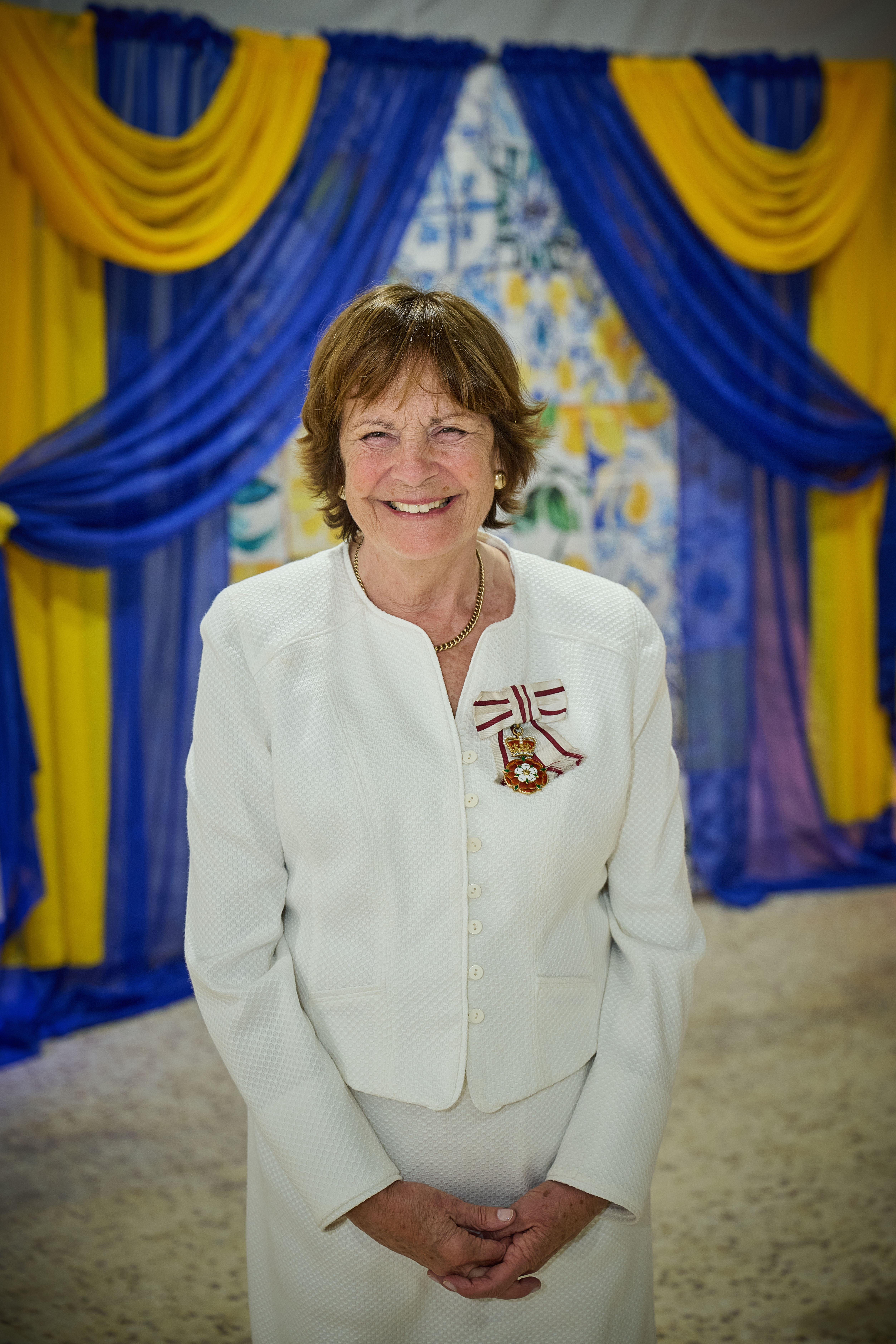 Lord-Lieutenant of Suffolk Clare, Countess of Euston - wearing a white outfit and smiling 